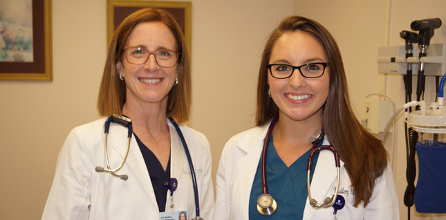 Gray Garrett, CRNP and Mallory Mullis, PA-C, smiling.
